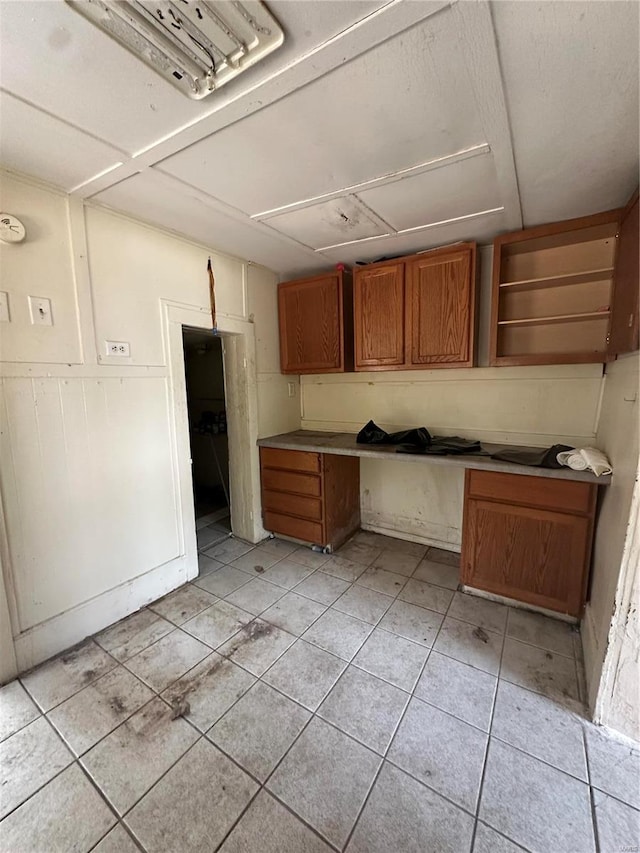 kitchen featuring light tile patterned flooring