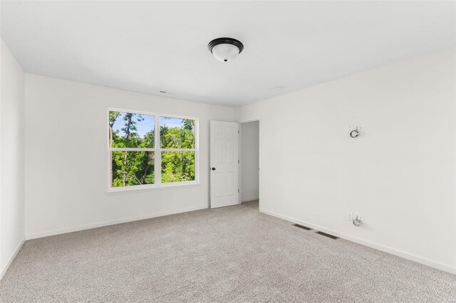 empty room with carpet floors