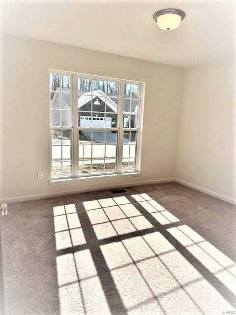 view of carpeted empty room