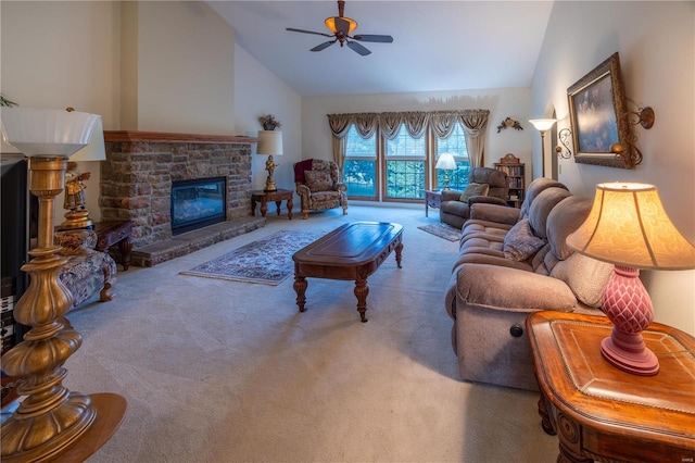 living room with lofted ceiling, ceiling fan, and carpet floors