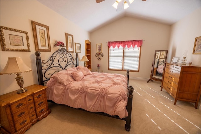 bedroom featuring ceiling fan, carpet floors, and vaulted ceiling