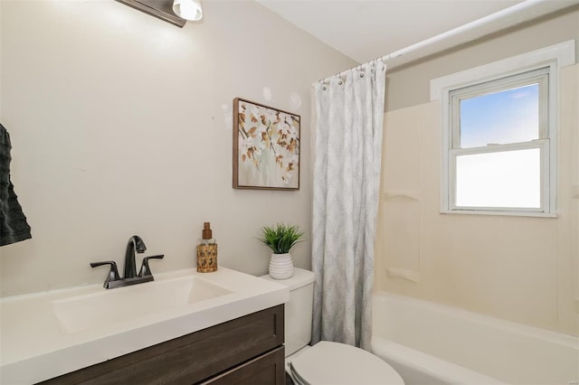 full bathroom featuring shower / bath combo, toilet, and vanity