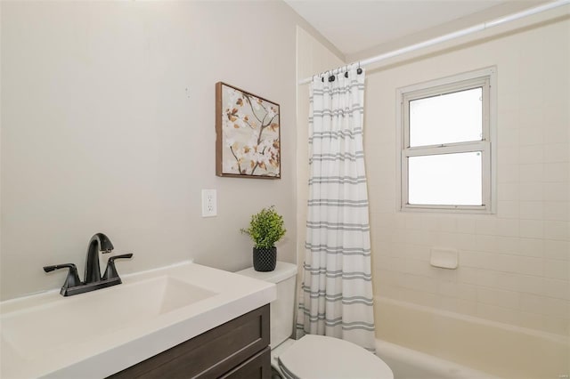 full bathroom with shower / bath combo, toilet, and vanity