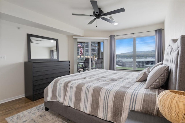 bedroom featuring ceiling fan and hardwood / wood-style floors