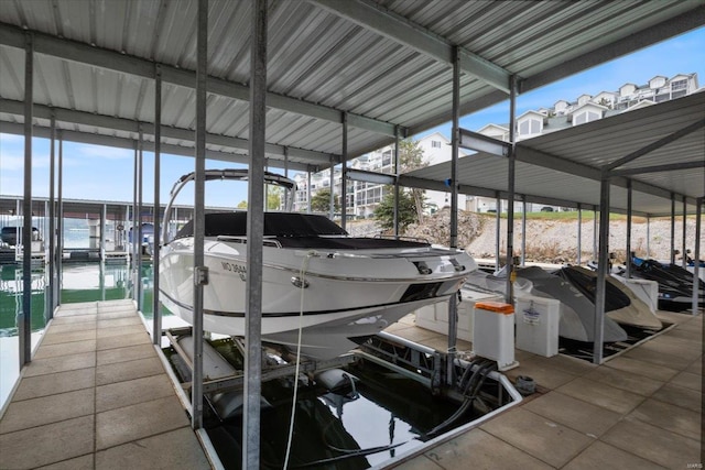 dock area with a water view