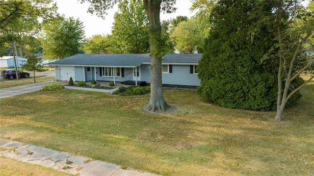 ranch-style house with a front lawn and a porch