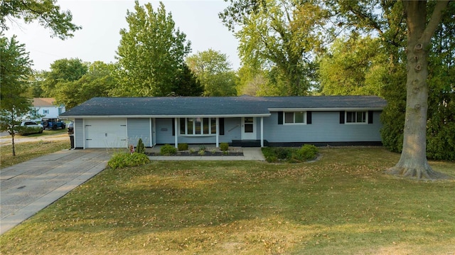 ranch-style home featuring a front yard and a garage