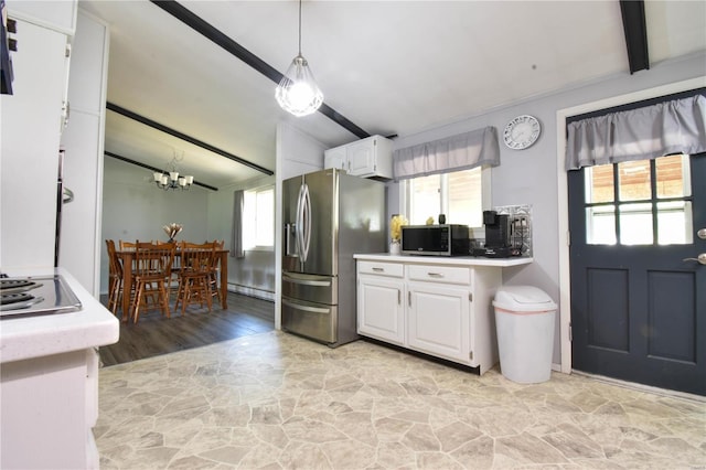 kitchen with white cabinetry, a baseboard heating unit, stainless steel appliances, an inviting chandelier, and hanging light fixtures