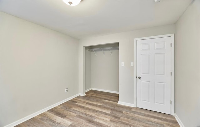 unfurnished bedroom featuring light hardwood / wood-style floors