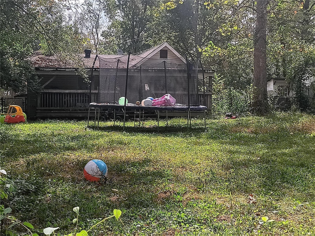 view of yard featuring a trampoline