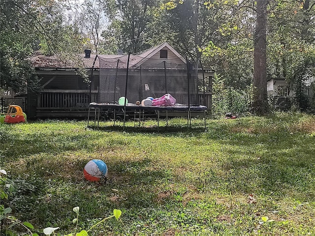 view of yard featuring a trampoline