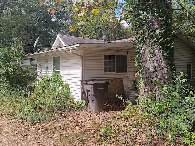 view of outdoor structure with central AC unit