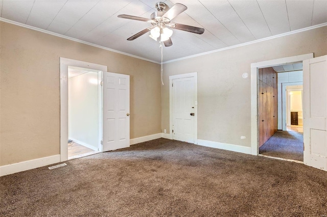 interior space with baseboards, ceiling fan, and crown molding
