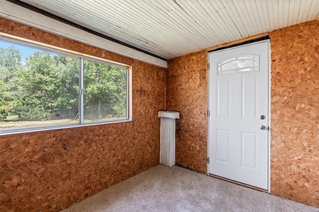 unfurnished room with carpet floors