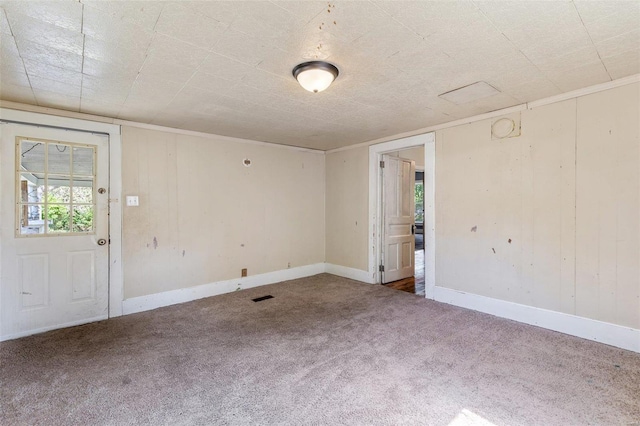 spare room featuring carpet flooring