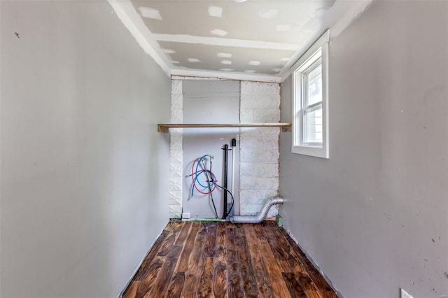 laundry area with hookup for a washing machine and wood finished floors