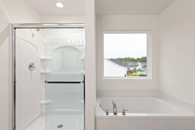 bathroom with independent shower and bath