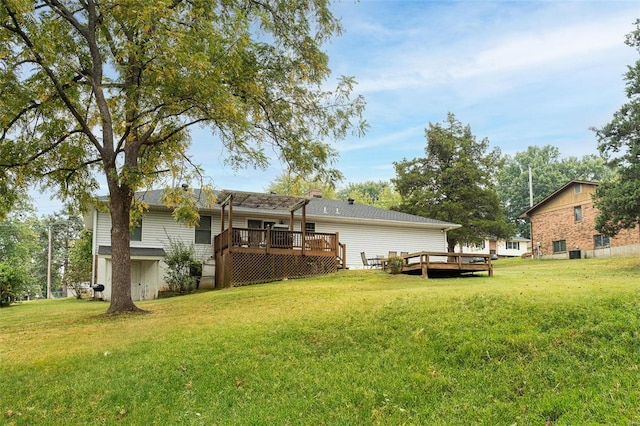 view of yard with a wooden deck