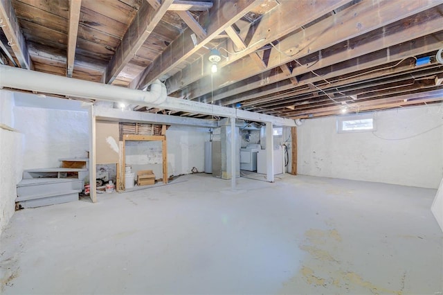 basement featuring independent washer and dryer