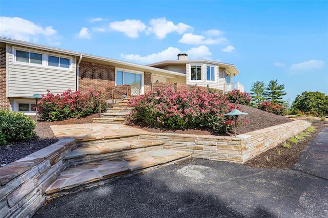 view of front of home with a patio