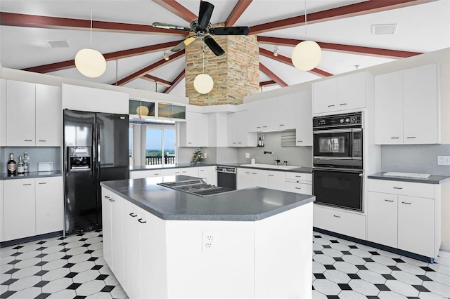 kitchen with a kitchen island, decorative light fixtures, white cabinets, and black appliances