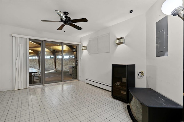 tiled living room with ceiling fan, a baseboard radiator, and electric panel