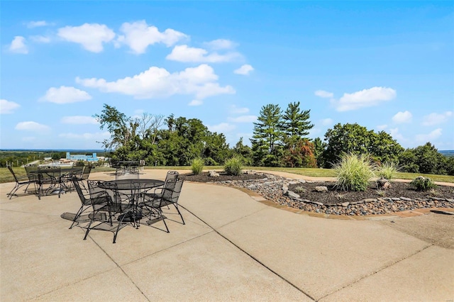 view of patio / terrace with a water view