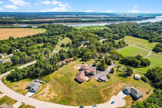 bird's eye view with a water view and a rural view