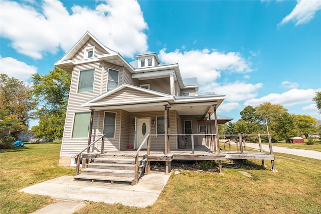 view of front of home with a front lawn