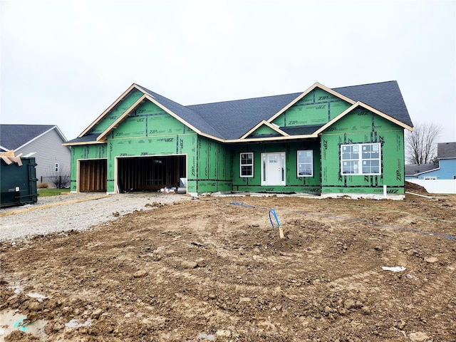 property under construction featuring a garage