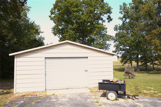 garage with a yard