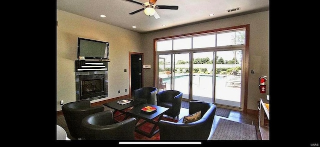 interior space featuring hardwood / wood-style floors and ceiling fan