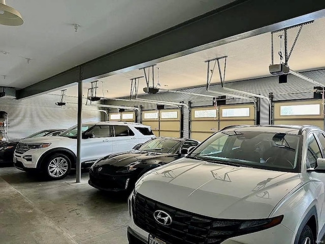 garage featuring a garage door opener