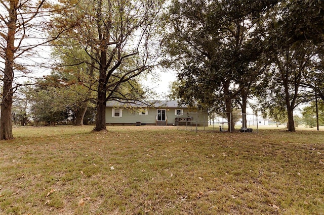 view of front of home featuring a front lawn