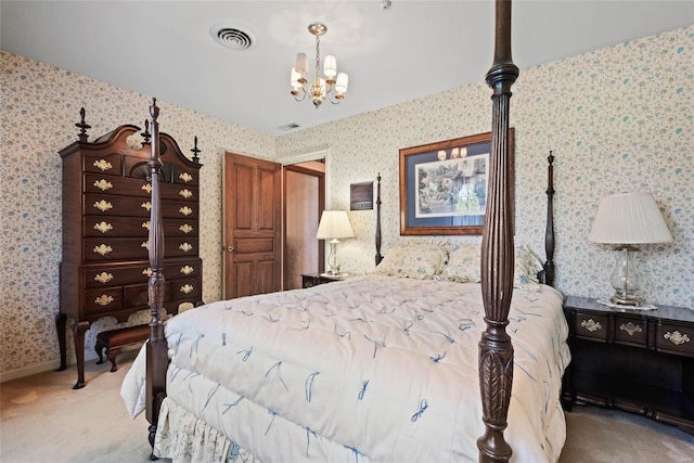 bedroom featuring light carpet and a notable chandelier