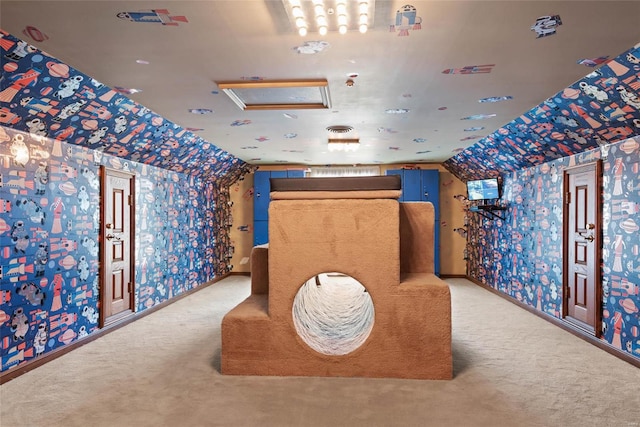 recreation room with lofted ceiling and light carpet