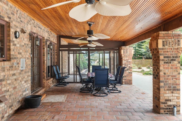 view of patio featuring ceiling fan