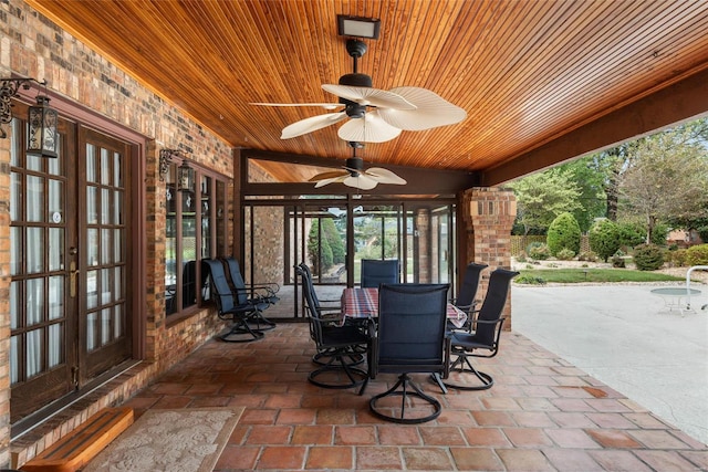 view of patio with ceiling fan and french doors