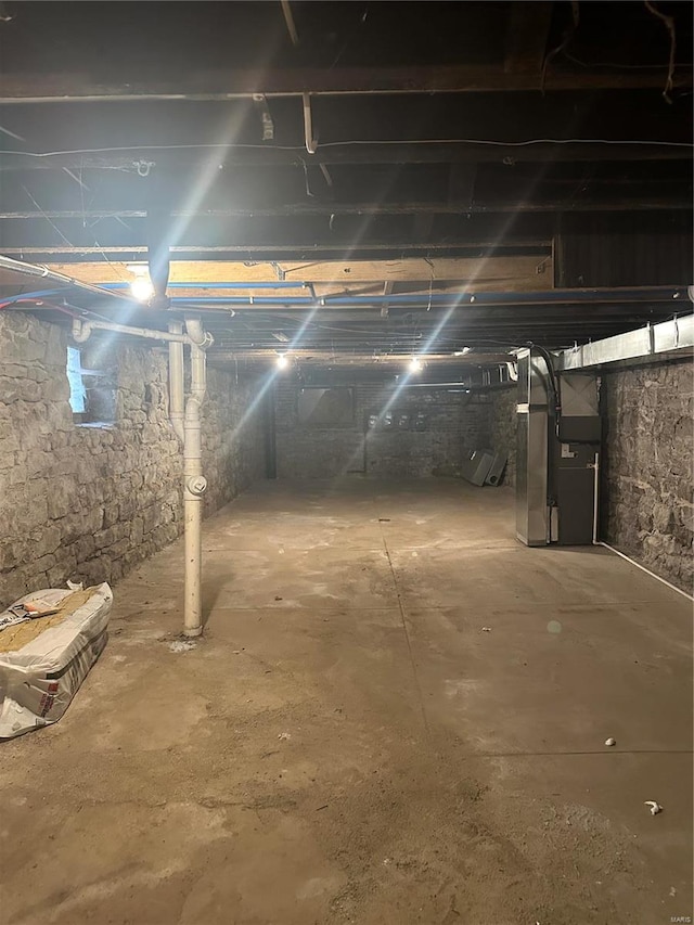 basement with heating unit