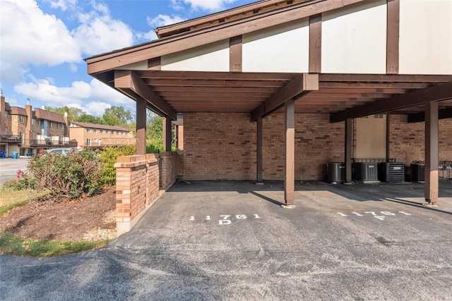 view of parking with a carport