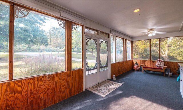 sunroom with ceiling fan and a wealth of natural light