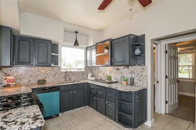 kitchen with stainless steel dishwasher, ceiling fan, sink, and a healthy amount of sunlight