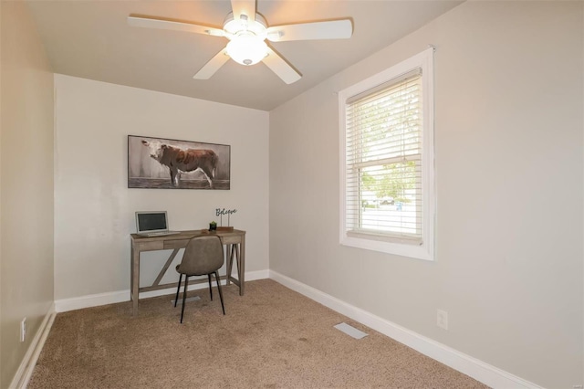 office area featuring carpet flooring and ceiling fan