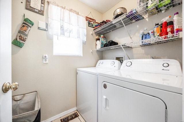 laundry area featuring independent washer and dryer