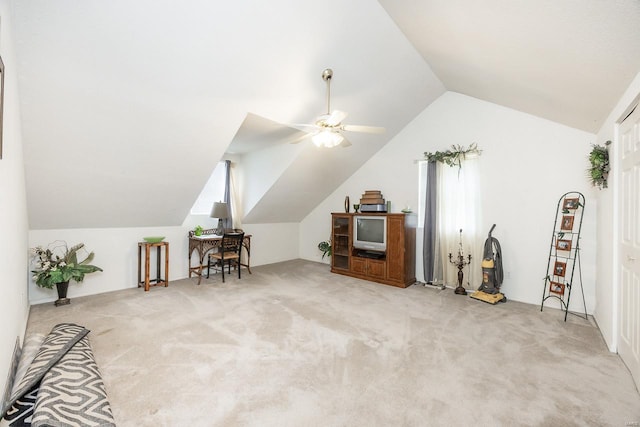 bonus room with ceiling fan, light colored carpet, and vaulted ceiling