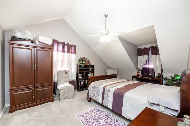 bedroom with light carpet, lofted ceiling, and ceiling fan