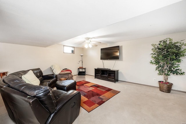 living room with carpet flooring and ceiling fan