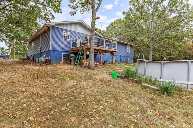 back of property with a deck