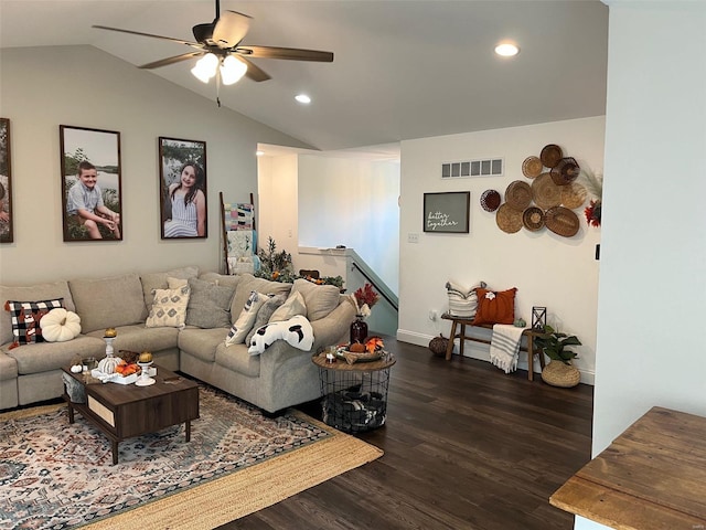 living room with vaulted ceiling, ceiling fan, and dark hardwood / wood-style floors