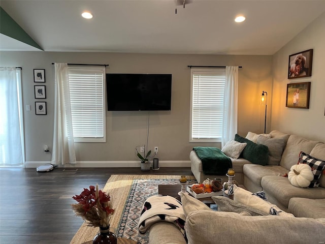 living room with dark wood-type flooring and vaulted ceiling